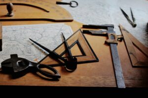 Photo by <a href="https://unsplash.com/@yer_a_wizard?utm_content=creditCopyText&amp;utm_medium=referral&amp;utm_source=unsplash">Fleur</a> on <a href="https://unsplash.com/photos/drafting-instruments-on-top-of-table-dQf7RZhMOJU?utm_content=creditCopyText&amp;utm_medium=referral&amp;utm_source=unsplash">Unsplash</a>